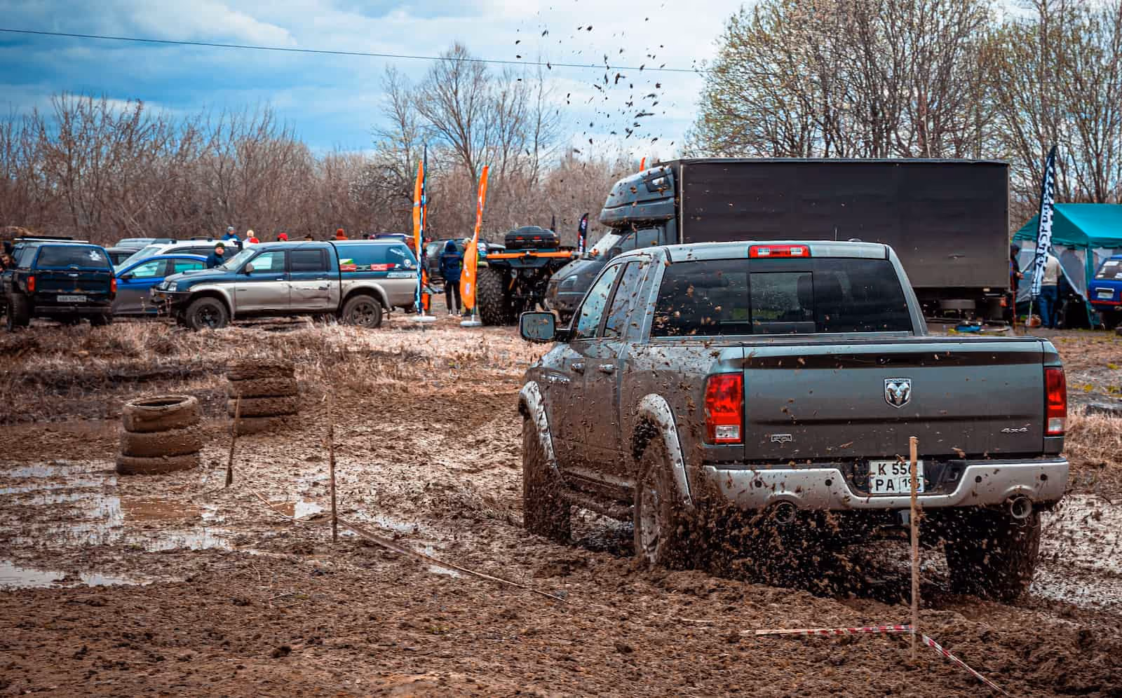 Image of vehicle parked on mud